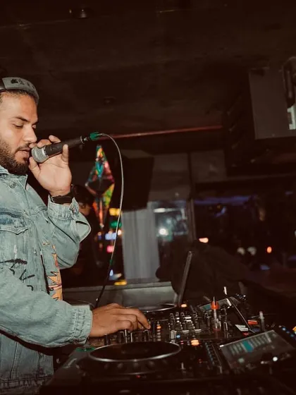 It's not just about playing tracks; it's about being an MC. I'm always on the microphone, hyping up the crowd, making announcements, and connecting with the audience.