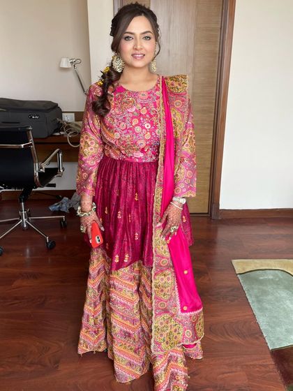 The full look is a perfect blend of tradition and modern style, ideal for a bride who wants to make a statement.