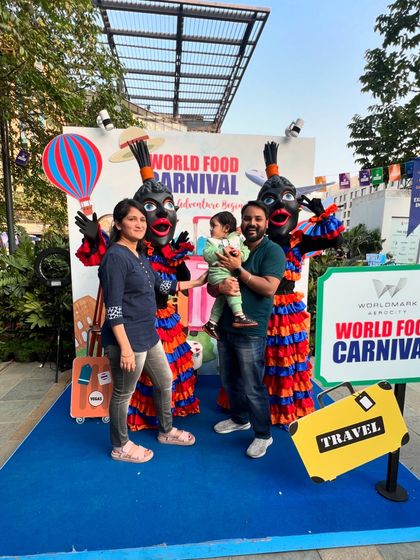 A family enjoys a day out at the World Food Carnival, posing with the event mascots. We pride ourselves on creating events that are enjoyable for the entire family.