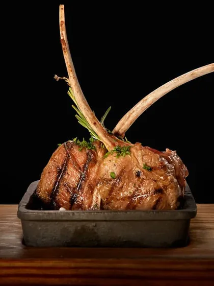 A generous portion of our grilled lamb chops, a dish that is both visually impressive and deeply satisfying.