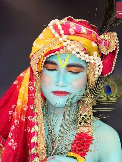 A serene, close-up shot of the Krishna makeup, highlighting the peaceful expression and detailed artistry.