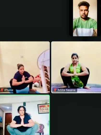 A snapshot from one of our live online group yoga classes. Even through a screen, I make sure to observe everyone's posture, like in this Malasana (Garland Pose), to provide personal corrections and build a strong virtual community.