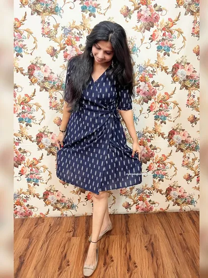 This navy blue Ikat Angrakha is a classic. The wrap style is universally flattering, and the handloom fabric makes it a truly special piece.