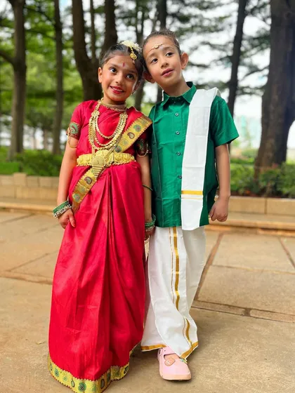 Posing for the camera, these two little stars are the embodiment of our studio's spirit. We nurture talent and confidence from the very first dance step.