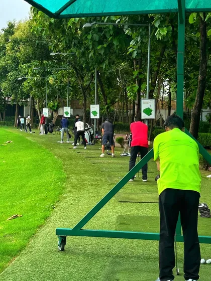A view from behind the bays, showing a full house of golfers enjoying their Sunday practice.