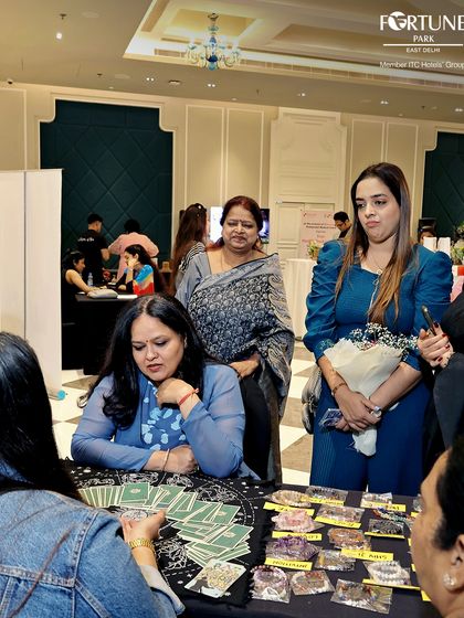 My events often feature engaging experiences like tarot readings, as seen here at my Women's Day celebration. These unique touches, combined with opportunities for shopping and socializing, make for a truly special day out.