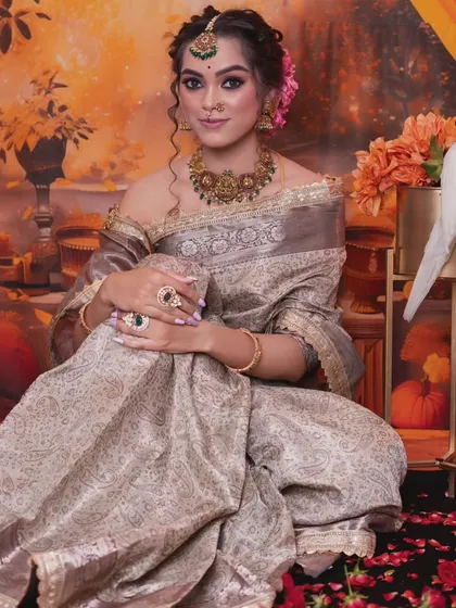 This model is wearing an antique choker with a modern off-shoulder blouse, showing how you can mix and match styles for a unique look.
