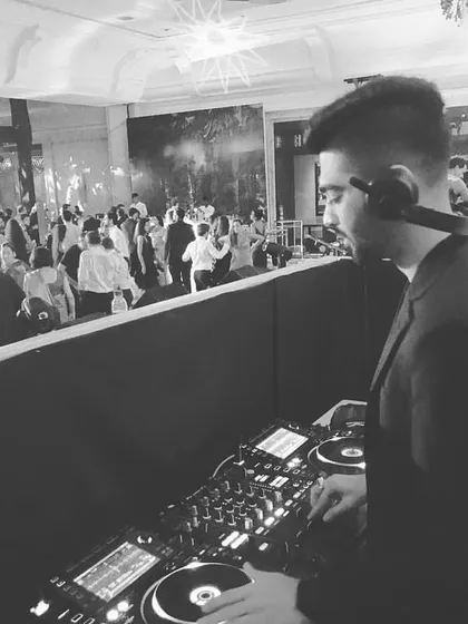 A black and white shot overlooking the dance floor at a large wedding event in Goa. Managing the music for a multi-day destination wedding requires careful planning and a deep playlist to suit every function.