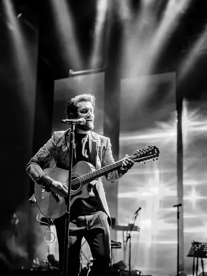 A black and white shot of Atif Aslam, capturing the raw emotion of his performance. We believe in creating powerful moments that resonate long after the night is over.