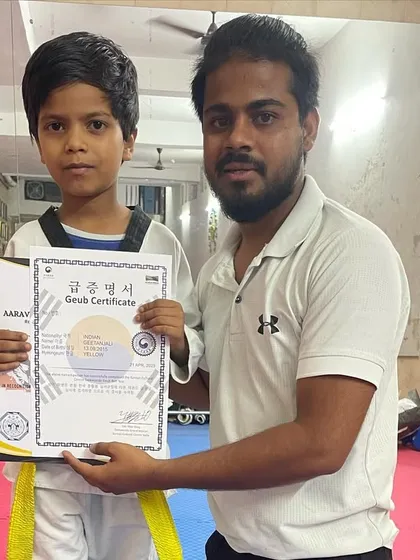 This young champion proudly holds his Geub certificate, an official recognition of his new rank from Korea. We ensure all our promotions are formally certified.