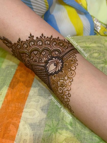 A beautiful armband design for Zeba, featuring a central motif with delicate net work.