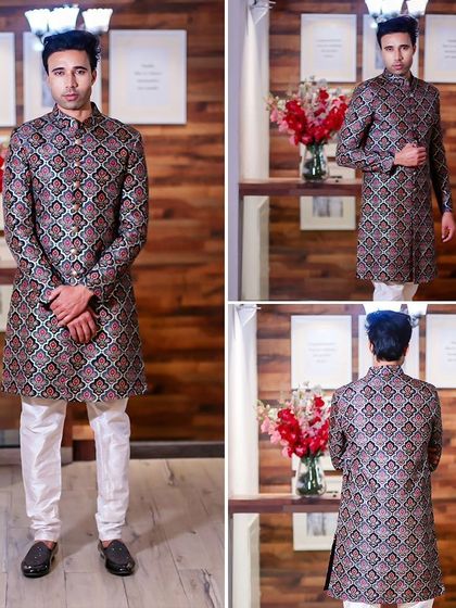 For a more traditional feel, this geometric print sherwani in darker tones offers a sophisticated and grounded look.