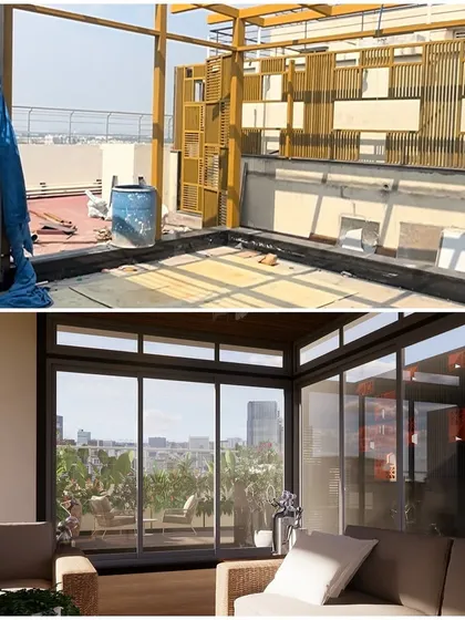 The view from inside the penthouse, showing how our design transforms the exterior from a bare slab into a seamless extension of the living area with floor-to-ceiling glass.