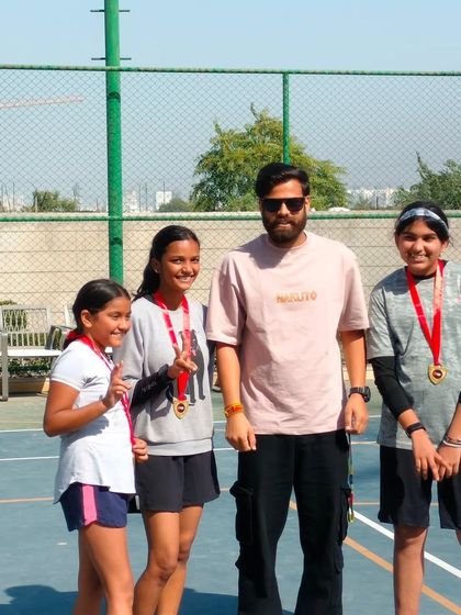 A group of proud medal winners from one of my Inter-Society basketball events. Their smiles show the joy of competition and achievement.