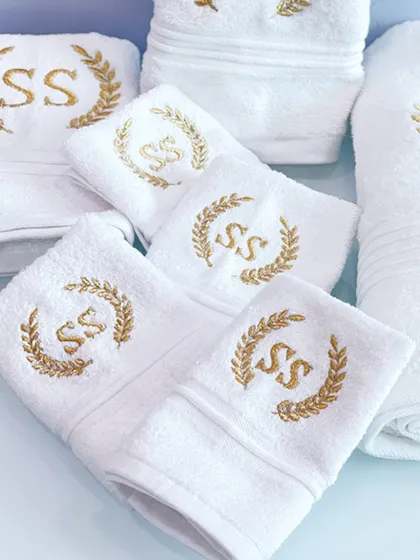 A detailed shot of the beautiful gold embroidery on the custom "SS" monogrammed towels.