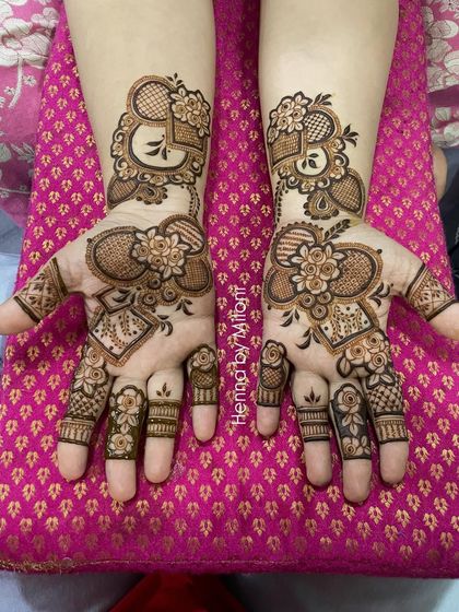 A modern floral design with a unique heart-shaped layout, perfect for an engagement or anniversary.