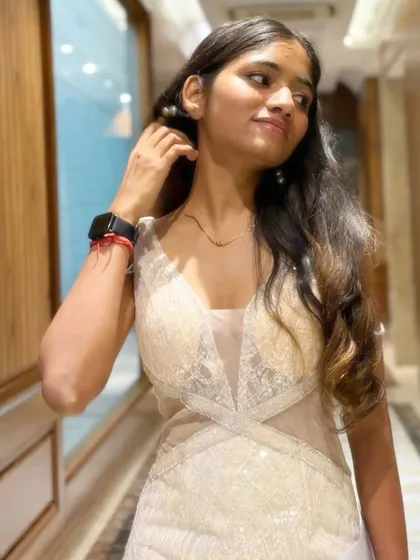 A candid moment before the event begins. My style is a mix of modern and classic, allowing me to fit in perfectly whether it's a traditional wedding ceremony or a contemporary party.