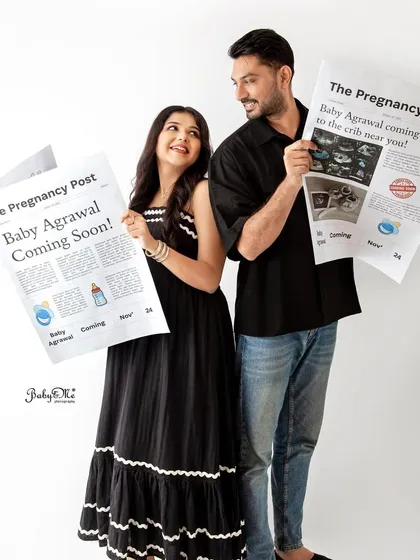 Extra, extra, read all about it. A baby is on the way. This custom newspaper prop is a creative and fun idea for a unique pregnancy announcement photo.