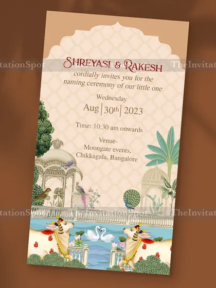 A Pichwai theme naming ceremony invite that is rich in tradition and artistry. The design features beautiful cows, swans, and architectural elements inspired by classic Pichwai paintings.