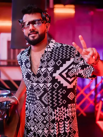 A peace sign for the camera. I believe that one day, I'll be living the life I prayed for.