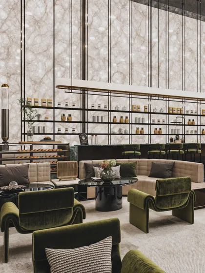 A hotel lounge area with a sophisticated palette of olive green and beige. The render highlights the backlit alabaster-like wall, creating a stunning feature.