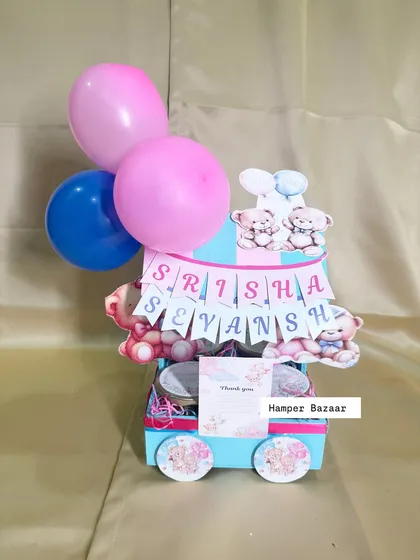 A full view of the teddy-themed twin hamper, a perfect way to thank guests for celebrating two little blessings.