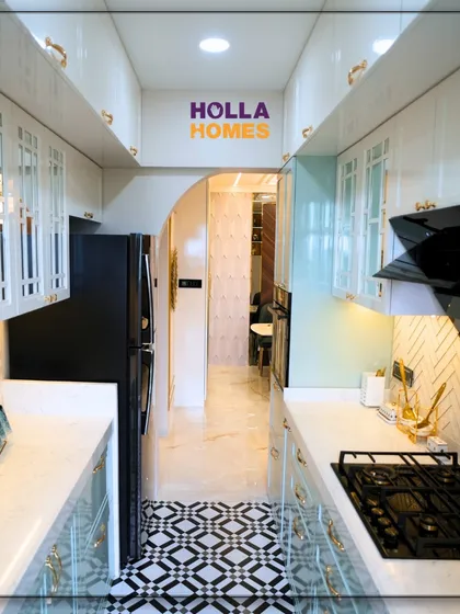This view shows how the vintage kitchen seamlessly connects to the rest of the home through an elegant archway. The consistent design language creates a smooth flow between spaces.