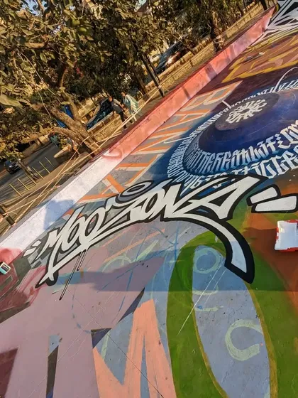 An angled shot of my graffiti piece at the Carter Road skatepark, showing how it flows with the curves of the park itself.