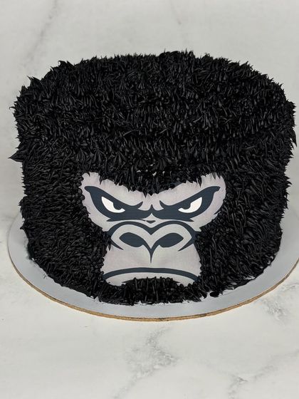 I wish the kid version of me had me as a baker. This gorilla cake with an intense stare was such a cool and unique request. The fur effect is created with carefully piped black buttercream.