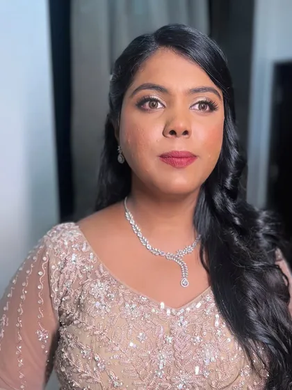 Radiant in love, the bride's beauty shines brighter than ever. A beautiful reception look created without a trial.