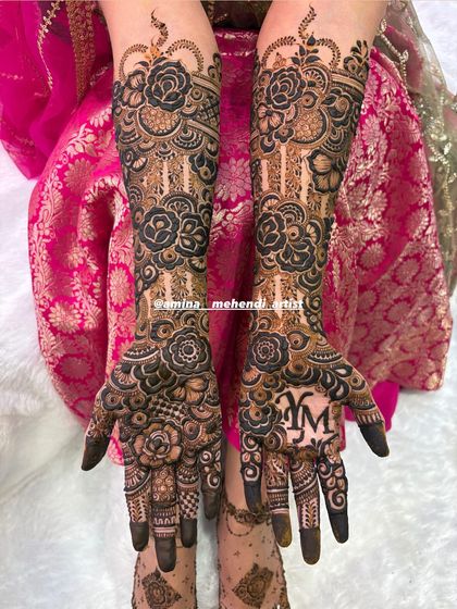 The back of the hands for a full bridal set, showing the continuation of the floral and geometric patterns.