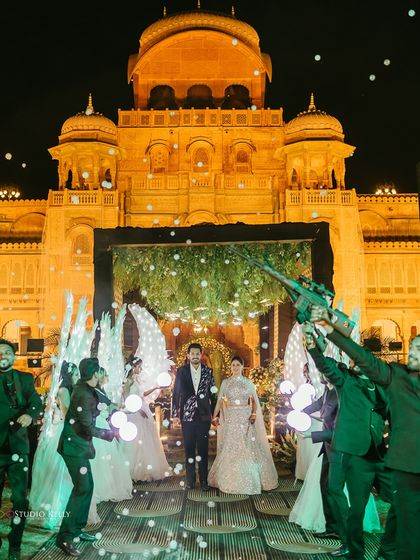 A grand entrance for the couple at their engagement, complete with cold pyro and a dramatic, celebratory atmosphere.