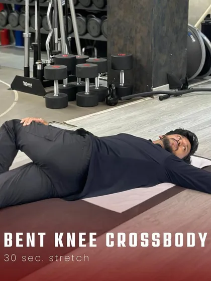 The bent knee crossbody stretch is a fantastic way to release tension in the lower back and glutes. I recommend holding this for at least 30 seconds on each side as part of your cool down routine.