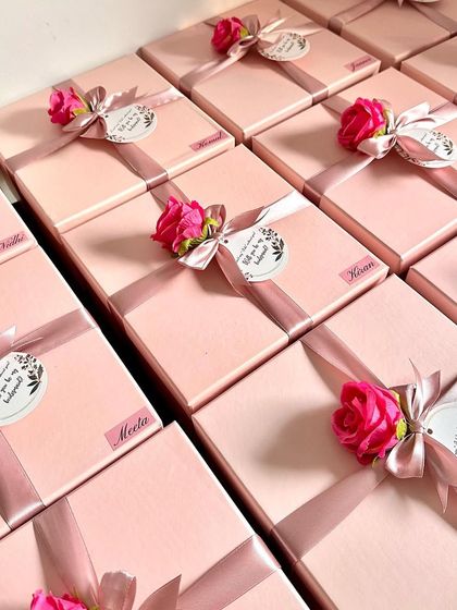 Another shot of our customized bridesmaid boxes, showing the pretty name stickers and floral details.