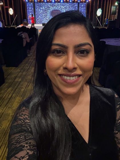 A selfie from my position at a Sangeet event, with the stage ready for action in the background. I am always prepared and in position to ensure the show runs smoothly.