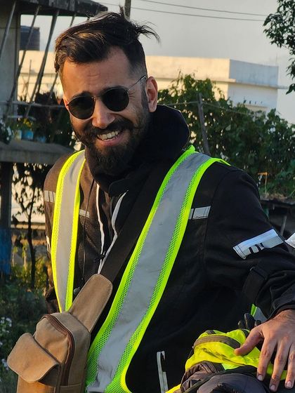 This candid, smiling portrait during a ride is perfect for lifestyle brands that want to convey a sense of joy and freedom.