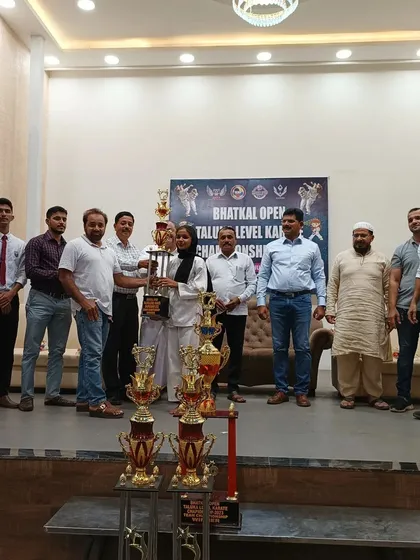 Another shot of our champion with her well-earned trophies. We celebrate every victory as a team.