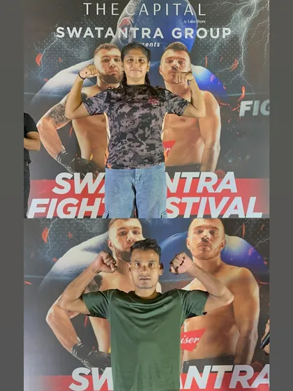 Hina and Ramith flexing after making weight. They are focused, ready, and proud to represent Team FCC. Tomorrow, it's all about leaving everything in the cage.