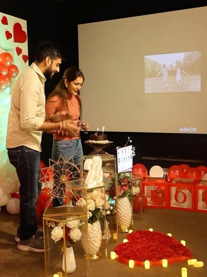 Cutting the cake with a backdrop of their own memories playing on the screen. This is a unique feature I offer to make your celebration even more personal and meaningful.