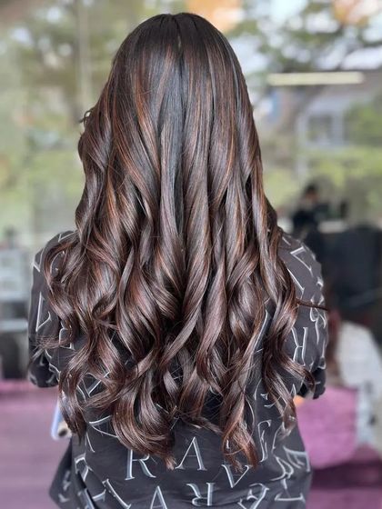 I feel like a princess when my hair sways in the air. This look features beautiful curls and subtle highlights.