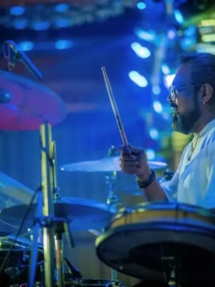 Our drummer, keeping the beat steady for a night of dancing and celebration.