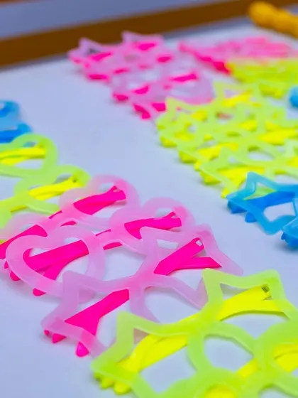 Colorful party favors like these star-shaped sunglasses are a great takeaway for guests and add to the fun during the event.