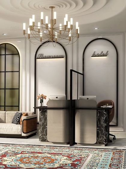 This elegant hotel lobby design shows how I tailor each space to a unique vision. The design features classic arches, a statement Persian rug, and modern furniture to create a welcoming and sophisticated entrance.