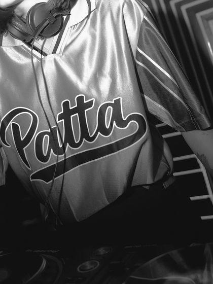A close-up on the details of this Patta jersey. Streetwear is a huge part of my personal style, and this black and white shot really makes the texture and design pop.