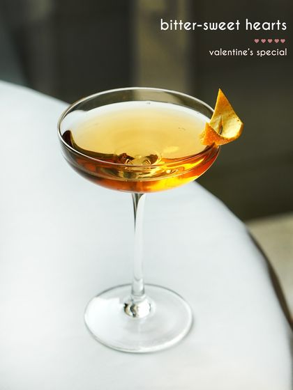 For Valentine's, we created the "Bitter-sweet Hearts" cocktail. This elegant drink, with its delicate orange peel garnish, was part of a special menu designed to celebrate romance with bold and playful flavors.