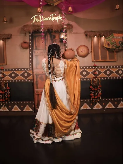 Using a matka (pot) as a prop in my 'Gori Radha' folk dance piece. Props can add a wonderful storytelling element to a performance.