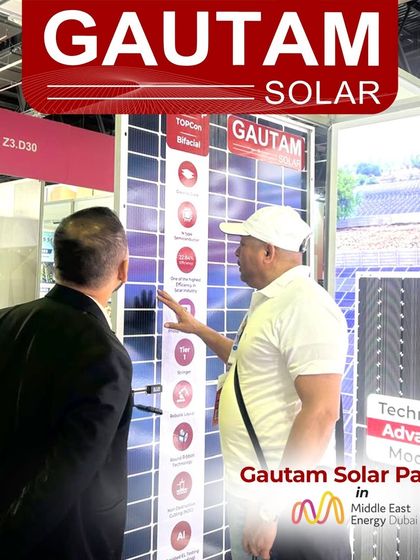 Explaining the technical specifications of our bifacial TOPCon modules to a visitor at the Middle East Energy Expo in Dubai.