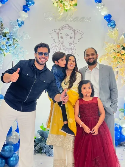 Another happy family picture from the birthday celebration. Creating smiles on these little faces is a special kind of joy.