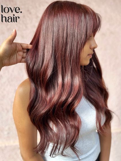 Another angle of the cherry-cola hair, showing how the colour looks from the side and how it complements the client's features.