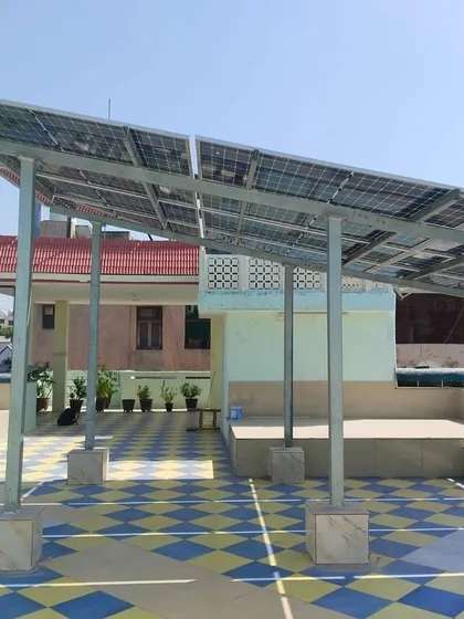 This 10 KW residential On-Grid solar project in West Delhi features an elevated mounting structure. This design preserves the rooftop area for other uses while ensuring the solar panels receive maximum sun exposure for optimal energy generation.